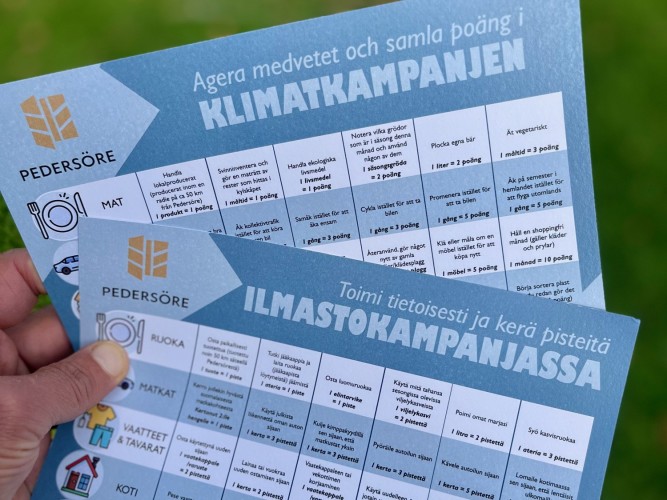 Ilmastokampanjan tuloskortti ruotsiksi ja suomeksi.